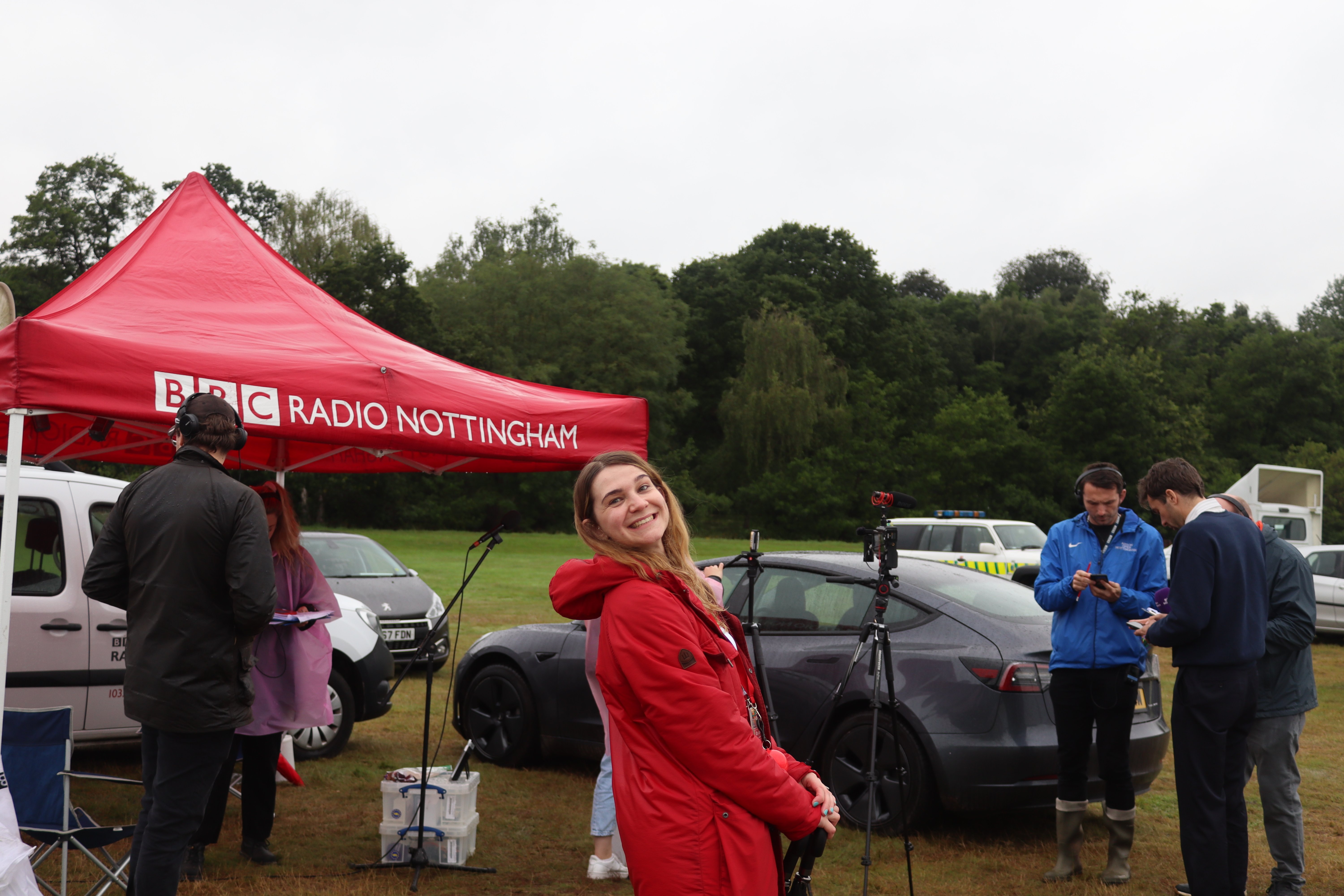 Carly sorting interviews between The Vaccines and BBC Nottingham outdoors