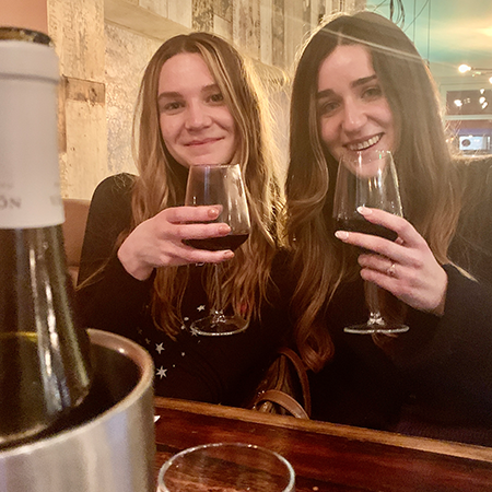 Carly and Catherine with wine