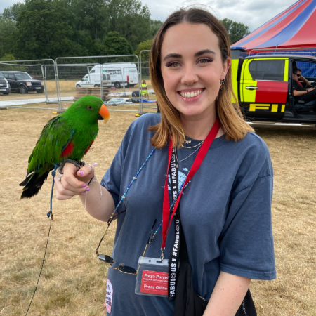 Freya and Barry the parrot at Splendour